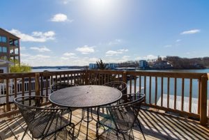 outdoor table on a deck overlooking the lake of the ozarks